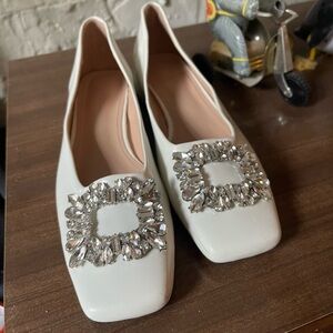 Bejeweled low heel shoes